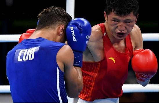 拳击总结:中国4奖牌收官 裁判成＂胜负关键手＂