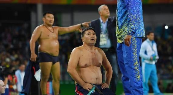 里约奥运脱衣抗议判罚 蒙古摔跤教练被禁赛三年