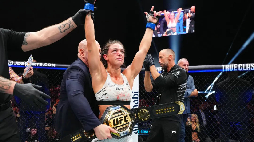 阿斯皮纳尔被插眼无结果收场,邓恩夺得UFC冠军金腰带