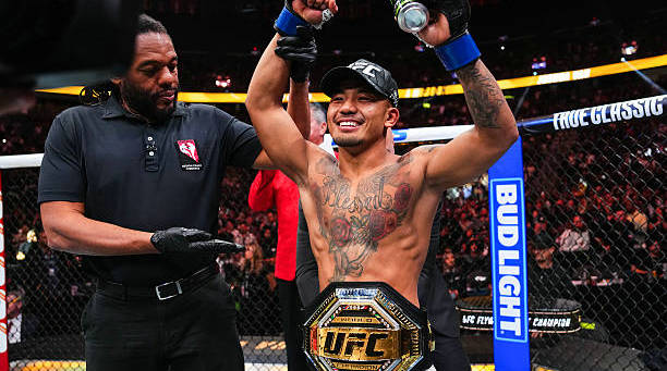 亚洲首位男子UFC冠军诞生！约书亚·万与彼得·严夺得金腰带